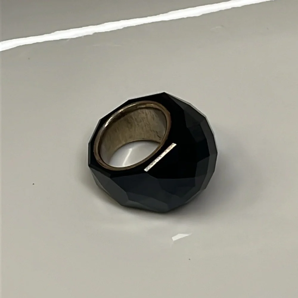 Daniel Swarovski Black Crystal Paris Ring with a Silver Tone Interior Band Color